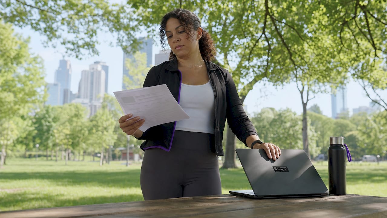 Professional woman working on SEO notes at desk